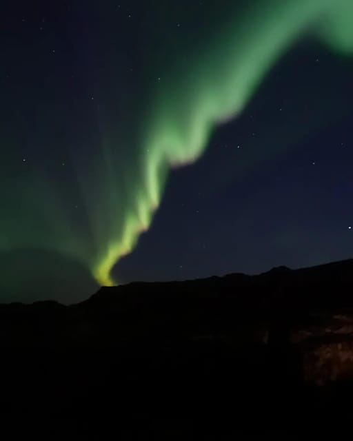 Kiruna: Northern Lights Minivan Chase with Warm Drink - Kiruna at night, and why a minivan helps