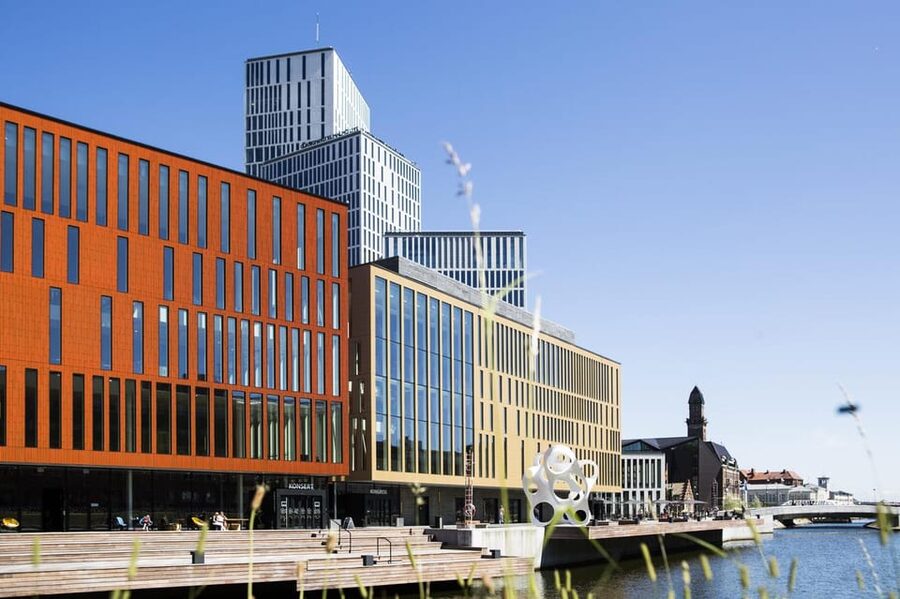Malmö: Sightseeing and Landmarks tour by bike - What the Guide Covers: Medieval Charm, Shipyard History, and Öresund