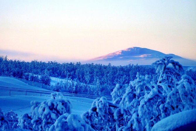 Snowmobile Safari to Lapland viewpoint - Frozen Lake Coffee, Swedish Fika, and Trying Ice Fishing