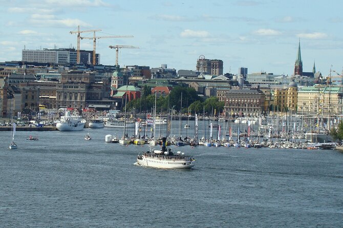 Stockholm- A Beauty On The Water: Old Town Walking Tour and Boat Trip Combined - Riksbron Bridge: Knights Island, Government Buildings, and Nobel Banquet Clues