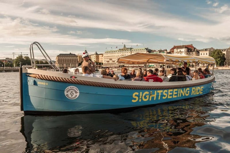 Stockholm: Guided City Sightseeing Open Electric Boat Tour - Meeting the guide at the blue boat in front of the Royal Palace