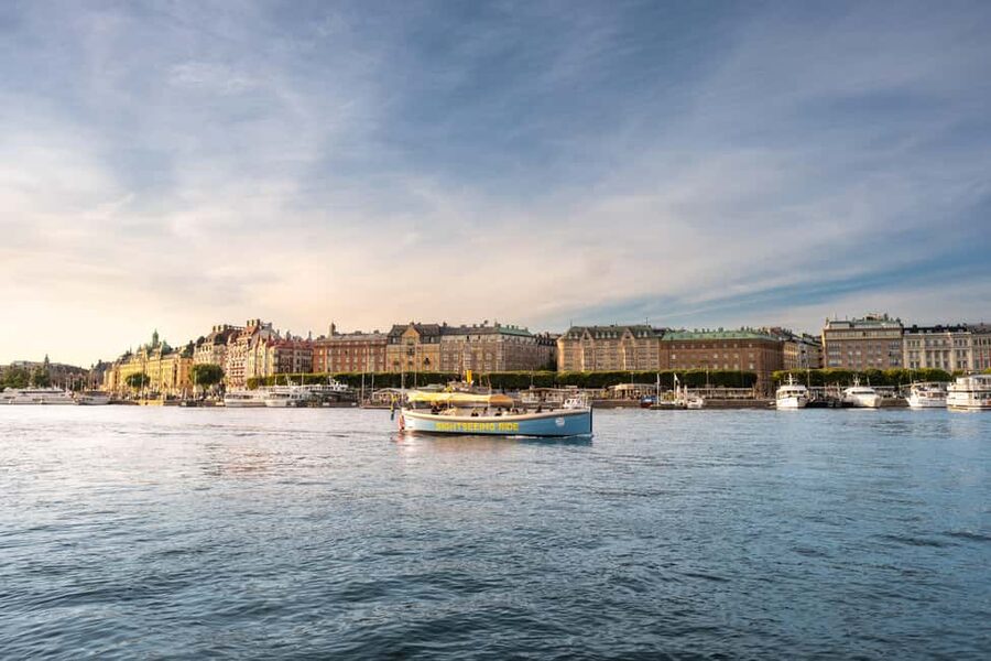 Stockholm: Guided City Sightseeing Open Electric Boat Tour - Royal Palace to Royal Dramatic Theatre, the royal storyline from the water