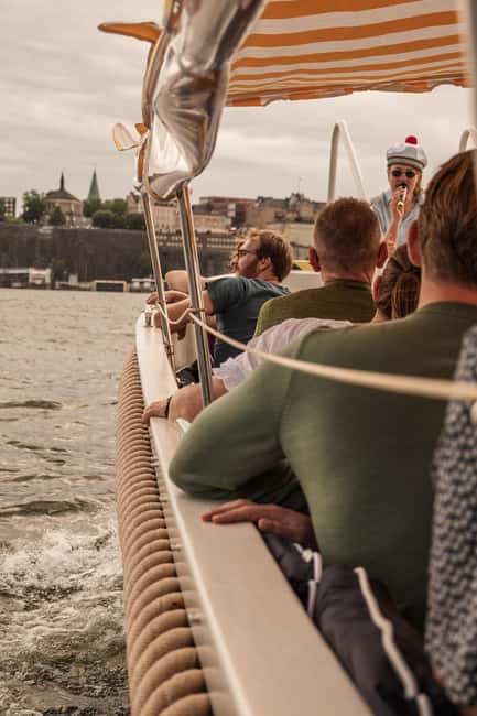 Stockholm: Guided City Sightseeing Open Electric Boat Tour - Comfort, photo angles, and the rain-or-shine reality