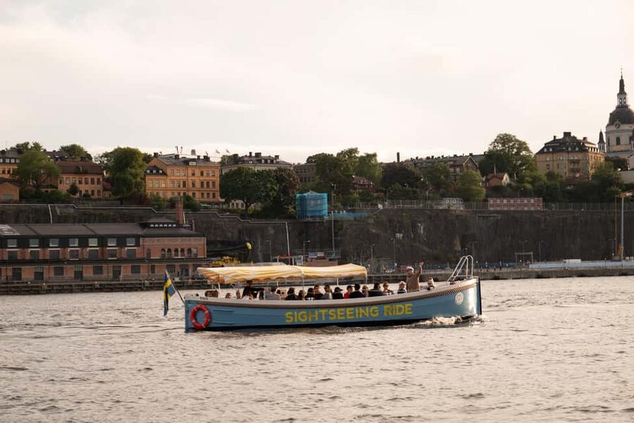 Stockholm: Guided City Sightseeing Open Electric Boat Tour - Price and value: $23 for a guided waterfront overview