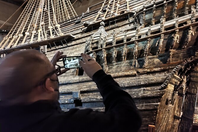 Stockholm Must See - Old Town, boat + Vasa Museum 3h small group - Skeppsbrokajen promenade and the ferry to Djurgården