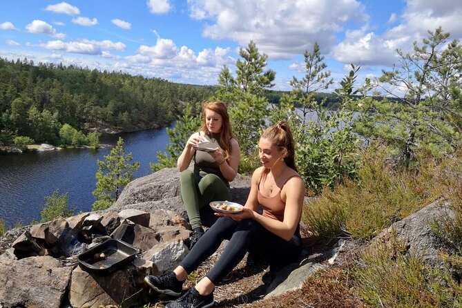 Stockholm: Nature Reserve Hiking Tour with Campfire Lunch - Second 2 hours, lakes, cliffs, and seasonal water scenes