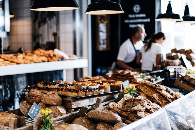 Stockholm Private Food Tour with a Local: Tastiest Treats 100% Personalized - Market hall and farmers market tasting, classic Swedish bites in real context