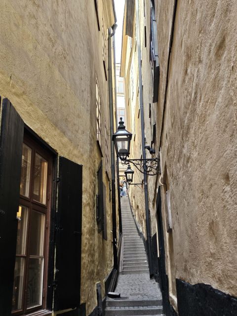Stockholm: Secrets of Gamla Stan Guided Tour w/ Fika Option - Spotting the Cannonball Detail That Freezes a Moment in Time