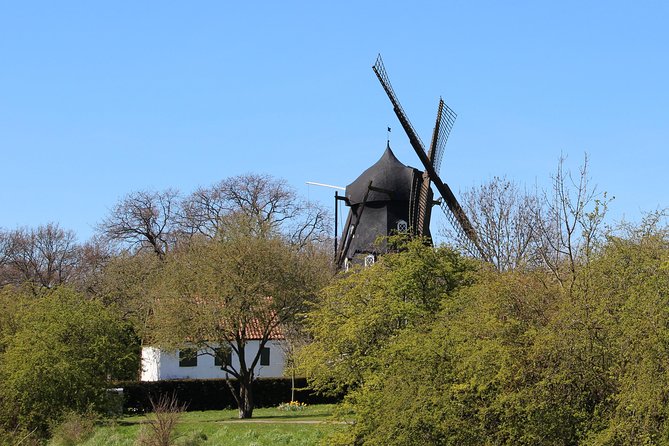 Walk Malmö with an audio guide - Historical squares and after-work energy, then into the shopping street